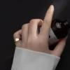 2267a8582618bb7c6317f31a921e9f73 Sterling Silver Minimalist Midi Pinky Ring