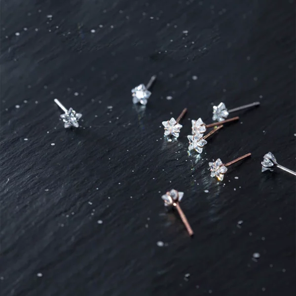 01360dae724e355366e34ae9f03aa7be Sterling Silver Star Shape Diamond Stud Earrings
