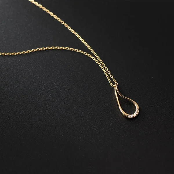 1608007815d942700a6dec1482962b20 Sterling Silver Cut-Out Teardrop Pendant Necklace
