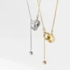 1d47a2cfe58a53365b5d1544b2ce6658 Sterling Silver Eternal Double Ring Drop Necklace