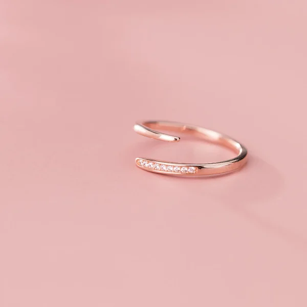 2ef697f87d44f65c98955da412a237cf Sterling Silver Diamond Open Zirconia Adjustable Ring