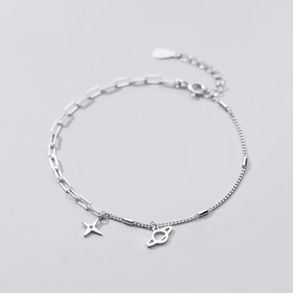 39be3e7dd8d029eebf72aa782c15f78b Sterling Silver Cut Out Dangly Galaxy Charm Bracelet