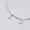 47e3dc3b36f7427f69d4795c5e9a430e Sterling Silver Cut Out Dangly Galaxy Charm Bracelet