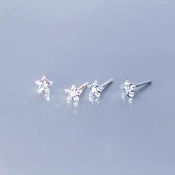 4b7c0decab73caa1473917eebd91fbd0 Sterling Silver Star Shape Diamond Stud Earrings