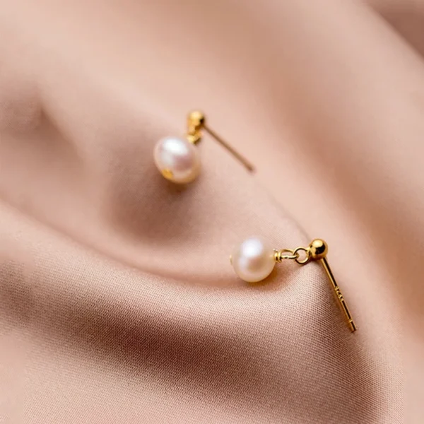 7757a0df6548eaafd19befede5cd35c6 Sterling Silver Freshwater Pearl Drop Earrings