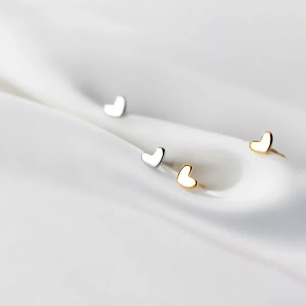 91b18dc1a2cc3960cb65539ef2c66089 Sterling Silver Heart Shape Stud Earrings