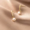 9cabbba3ee069e04a5fcdde50a09330d Sterling Silver Freshwater Pearl Cubic Zirconia Drop Earrings