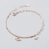 9cdf66b6857169b698edcfe60fb1705e Sterling Silver Cut Out Dangly Galaxy Charm Bracelet