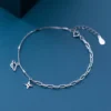 b222d37954a1aaba5bae54f5e6937552 Sterling Silver Cut Out Dangly Galaxy Charm Bracelet
