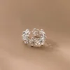 b777537417c4ee460afbd3c17496f143 Sterling Silver Cut Out Daisy Ring