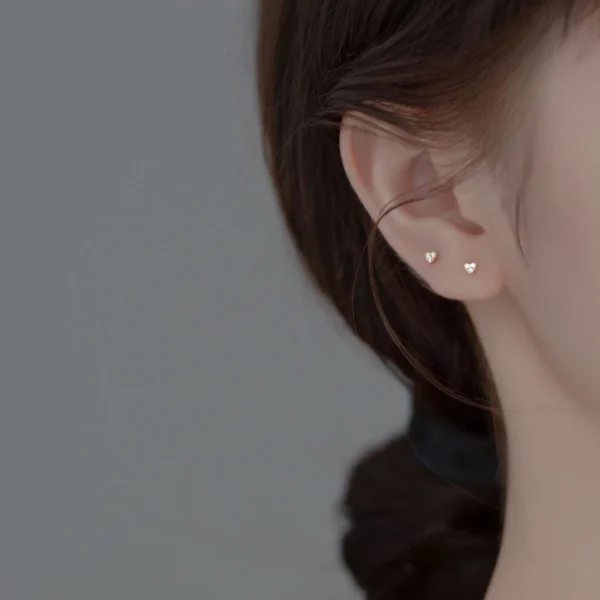 d19796d6f4b5af5798685f710f0c7a6e Sterling Silver Dainty Heart Stud Earrings