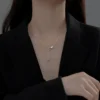 ef85a433761c5303f12b7a77805f796d Sterling Silver Eternal Double Ring Drop Necklace