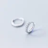 f12bee09df7ba899cd9dd5354b09839b Sterling Silver Cubic Zirconia Sleeper Hoop Earrings