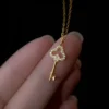my-11134207-7qul8-liu2cnhuf6g393 Sterling Silver Mini Crown Key Pendant Necklace