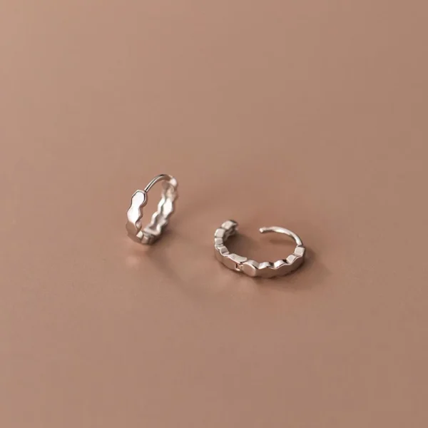 sg-11134201-22100-p8fqanxxubiva4 Sterling Silver Radiant Textured Huggie Earrings